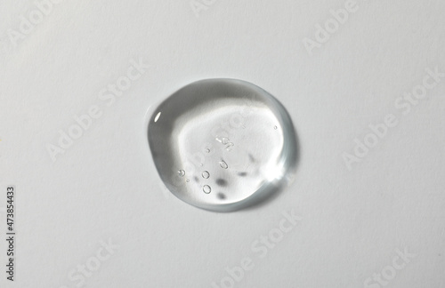 Sample of cosmetic gel on white background, top view