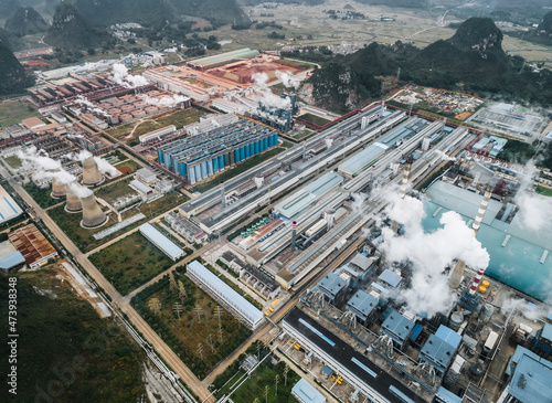 Aerial photography of an alumina plant built on a karst landscape