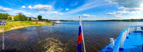 Volga River, Kostroma, Russia. Cruise ship departs from the pier, panoramic view