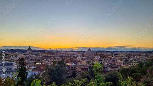Beautiful sunset over Vatican city and Rome. Rooftops seen from Villa Medici