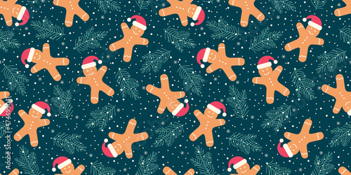 Festive seamless pattern gingerbread man and Christmas tree on a dark background. Vector illustration.