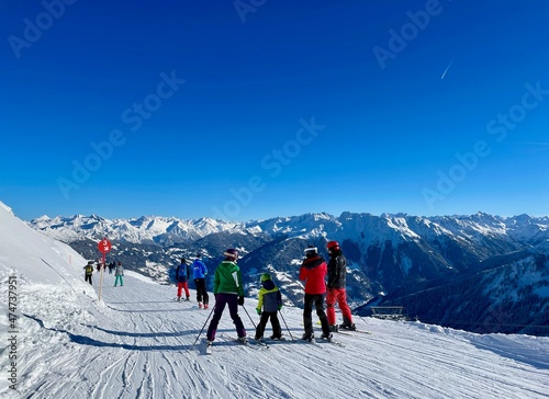 Skiers in winter resort Golm, Voralberg, Austria on a sunny day.