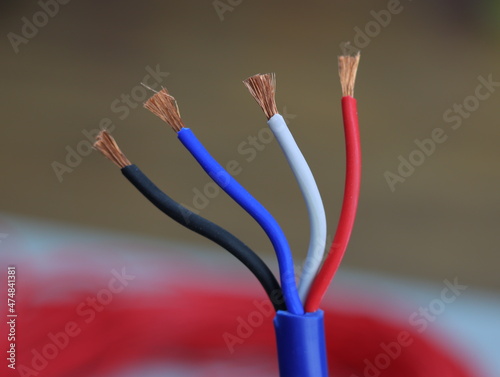 Cut electrical insulated wires close-up.