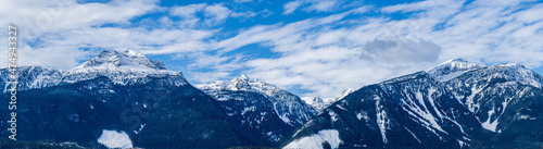 panorama of huge mountains covered by snow british columbia canada