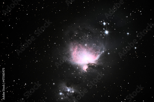 Orion Nebula, also known as Messier 42, M42, or NGC 1976, is a diffuse nebula located south of Orion's belt.