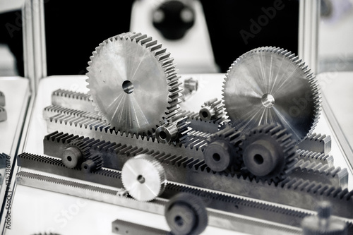 Spur gear rack and pinion. Toothed gear on a toothed shaft