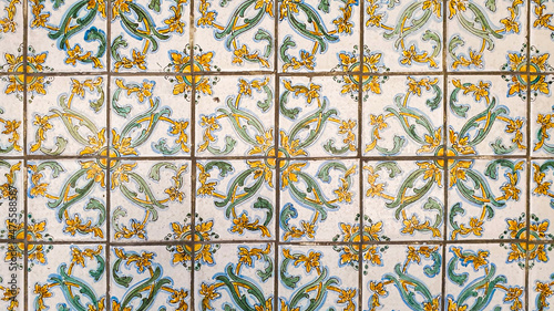 typical colorful sicilian ceramic floor and wall tiles with flower patterns and design