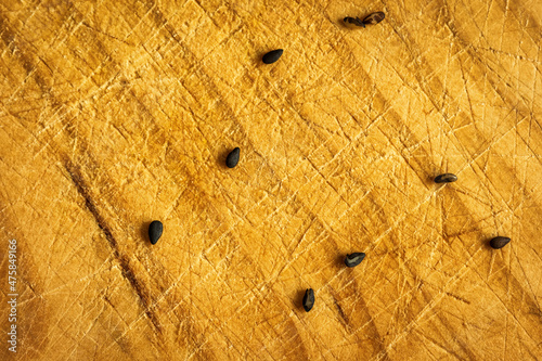black sezam seeds on wooden cutting board after sushi preparation