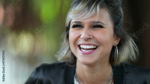 Happy blond woman smiling portrait close-up real life laugh and smile