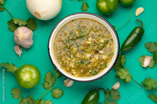 Green hot sauce with jalapeno pepper. Mexican food
