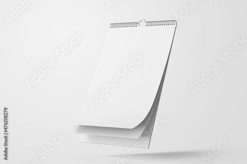 floating blank gray clean portrait wall wire binding calendar realistic mockup perspective view with flipping pages clay 3d rendering 3d illustration