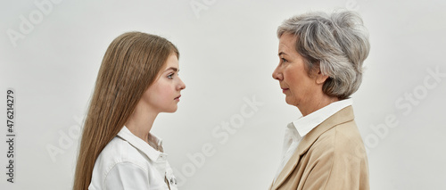 Granddaughter and grandmother look at each other