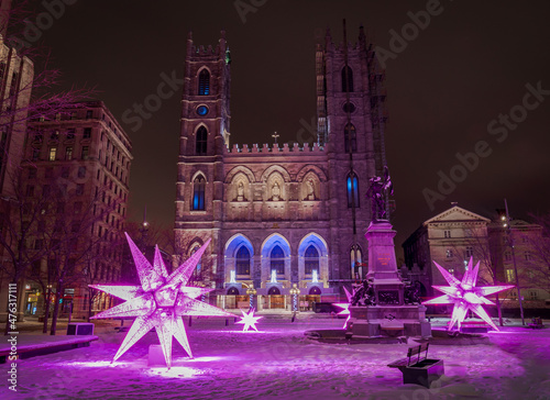illuminated winter festive Christmas decoration near Notre Dame Basilica