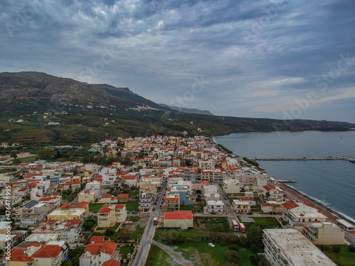 Aerial cityscape view of Neapolis town at sunset. Also named Vatika in Laconia, Greece. Neapoli is a famous coastal town built on the same site as the ancient Laconian city of Boeae