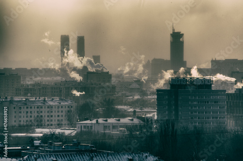 winter industrial landscape of Moscow. smoke from chimneys, snow, smoke in the air