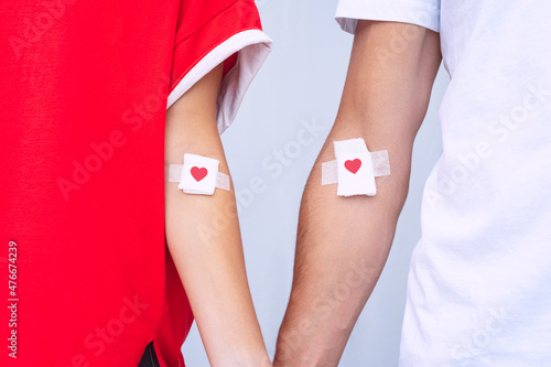 Man and woman blood donors. Blood donation. World blood donor day concept