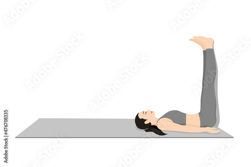 Legs up the Wall Pose, Viparita Karani, Inverted Pose Young attractive woman practicing yoga exercise. working out, black wearing sportswear, grey pants and top, indoor full length, calmness