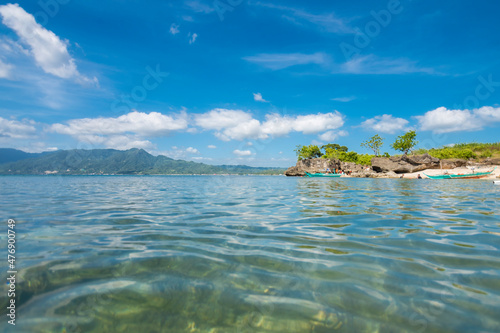 Low angle view of a rocky outcrop at a small cove at Laiya, San Juan, Batangas, Phillipines.