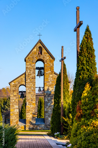 Stone belfry of parish church of St. Peter and Paul Apostles Upper Zagorzyce Gorne village in Podkarpacie region of Lesser Poland