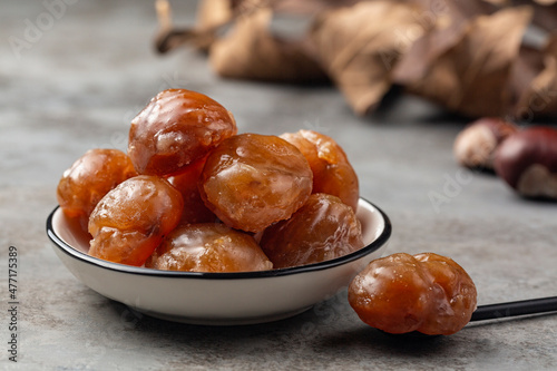 Marron glacé, confection, originating in northern Italy and southern France consisting of a chestnut candied in sugar syrup and glazed.