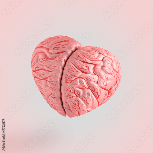 2022. Minimal love symbol scene made of orange-pink heart-shaped brain isolated on pastel beige background. Women’s day or valentine’s day card. Surreal abstract creative concept. Love thoughts idea.
