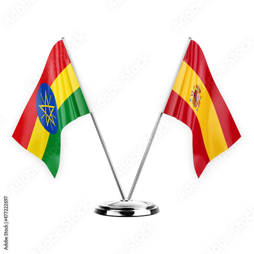 Two table flags isolated on white background 3d illustration, ethiopia and spain