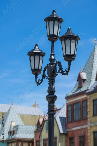 Classic victorian street lamps on an old fashioned iron lamp post set, close up