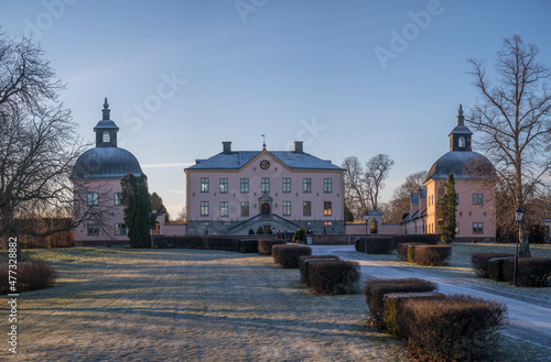 Old profane castle building from 1650s, Hässelby slott in its park a sunny frosty winter day in Stockholm