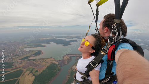 Skydive tandem selfie above Itaípu Dam, between Brazil and Paraguay.