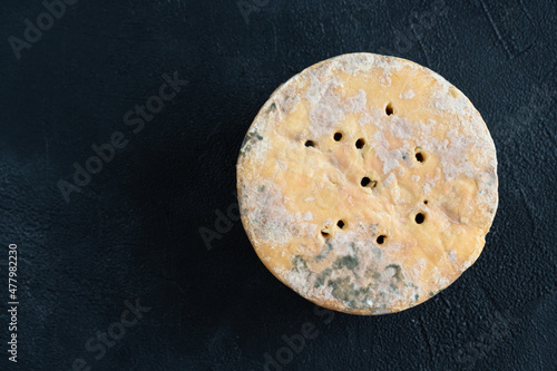 English Stilton cheese with blue mold.