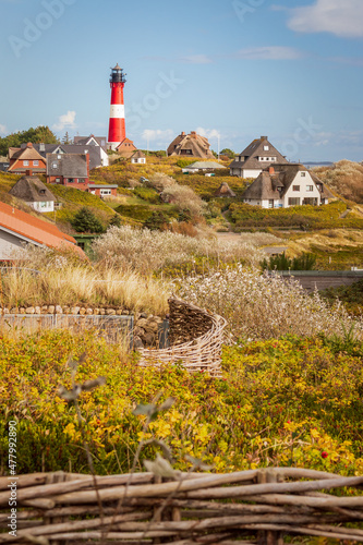 Lighthouse and dwellings at Hörnum, Sylt - Hilly part of the north sea village of Hörnum