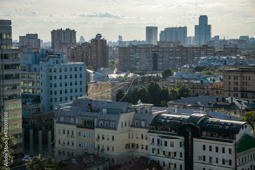 Moscow downtown. Evening view to multistory houses on light cloudy sky.