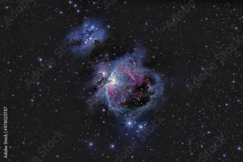 Orion Nebula M42 or NGC 1976 deep space emission nebula on the starry night sky