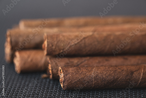 Little aroma cigars, close up. Tobacco smoking concept. Little depth of field, copy space