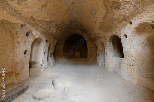 Cave church in Goreme, Cappadocia, Turkey. Cave town and houses at rock formations.