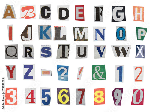 full alphabet of uppercase letters, digit numbers and symbols cut out from newspapers 