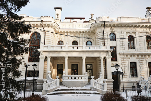 Beautiful rich, white merchant's house, old manor with columns and stucco, estate of Aseev. Built in 1904. Tambov, Russia.