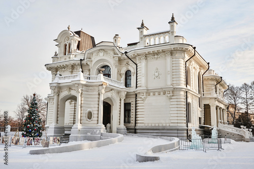 Beautiful rich, white merchant's house, old manor with columns and stucco, estate of Aseev. Built in 1904. Tambov, Russia.