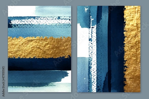 Abstract gold wall art diptych. Golden shiny and blue shades stripes. Watercolor brush strokes.