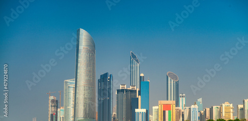 Abu Dhabi skyline and skyscrapers on a sunny day, UAE.