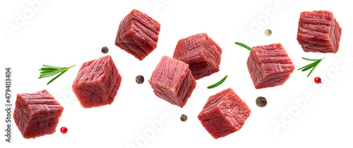 Cubes of raw beef meat isolated on white background