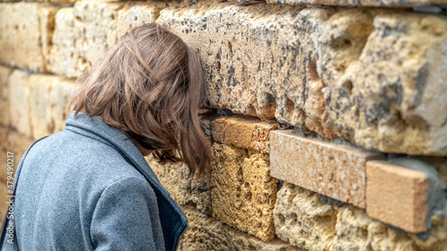 Jewish tourist prays in the wailing wall of Jerusalem, Israel