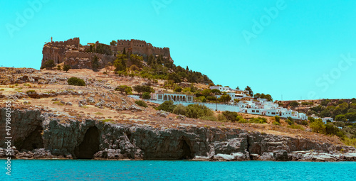 Lindos bay view on Rhodes island, seascape with coast greek village and ancient castle