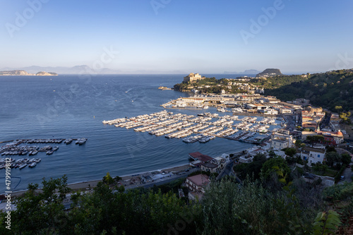 beautiful view of the port of Baia in the Campi Flegrei with Capri island and Sorrento peninsula in the background. Naples, Campania, Italy