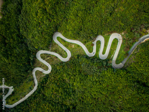 Aerial view of winding road through autumn forest in South Korea. 말티재, 로드맵, 구불구불, 커브길, 도로, 길.