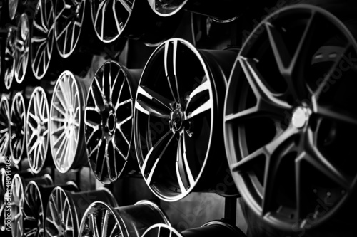 Car alloy wheels in a store, selective focus
