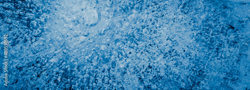 frozen water drops on a blue background