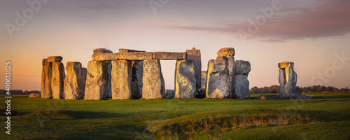 Panorama of the prehistoric site of Stonehenge during early morning. beautiful orange glow on the stones