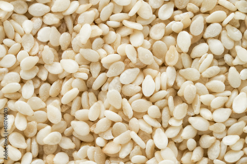 Sesame seeds as background. Flat lay, copy space