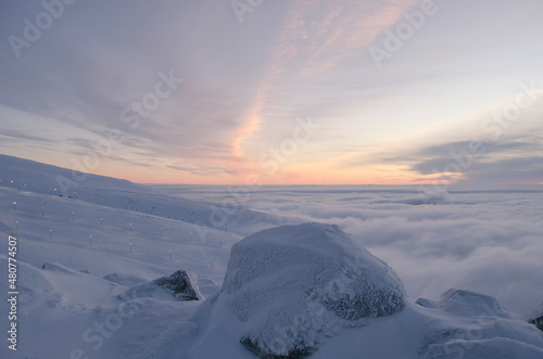 The Khibiny peaks lighted by the sun winter background